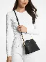 35F1GTVC6T - Jet Set Medium Dome Crossbody - Black Lifestyle.webp